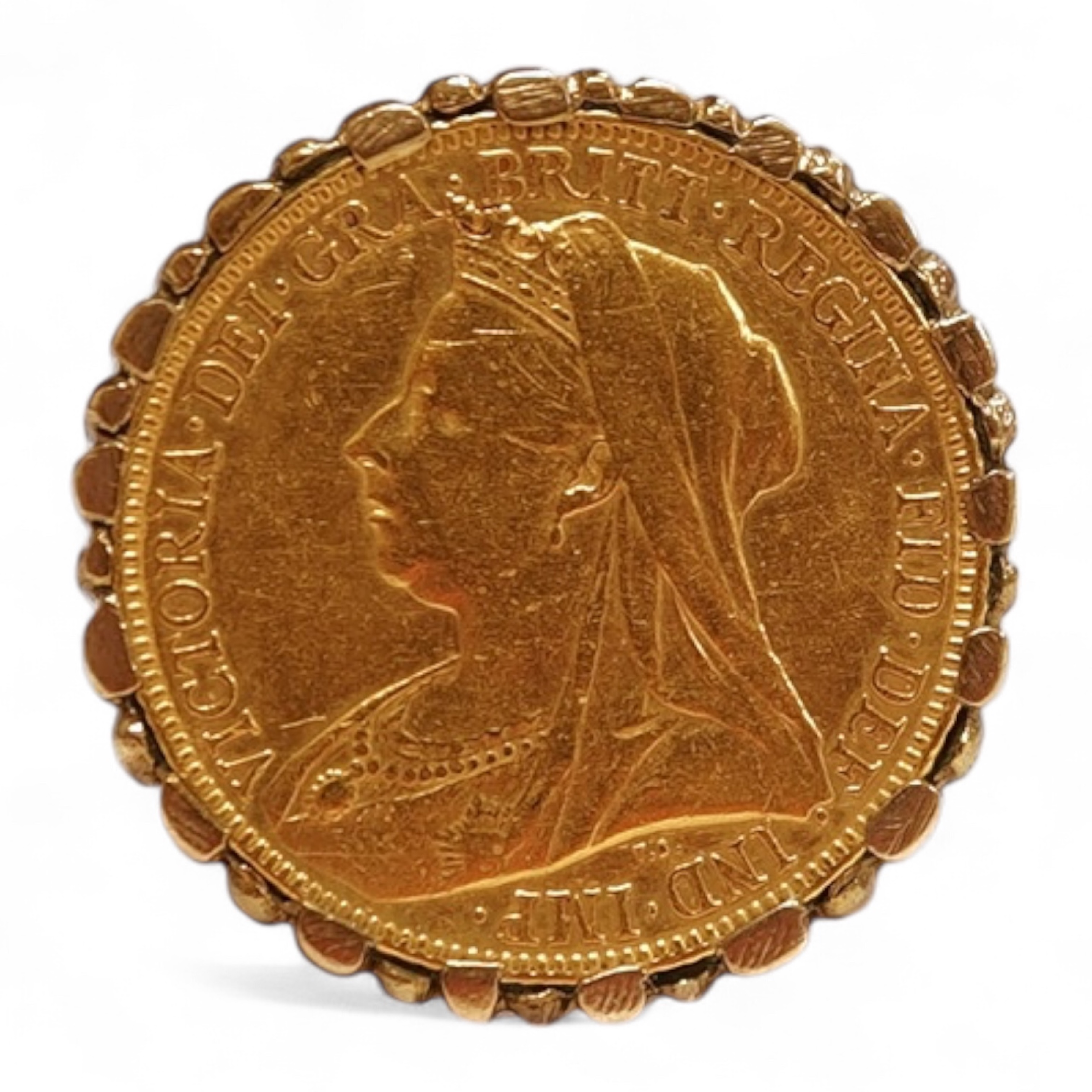 A sovereign ring, 1897 and later, set with a full sovereign dated 1897, to a fluted gold ring mount, size S (sizing band), ring mount stamped 9ct, gross weight 17 grams, Condition: typical surface wear